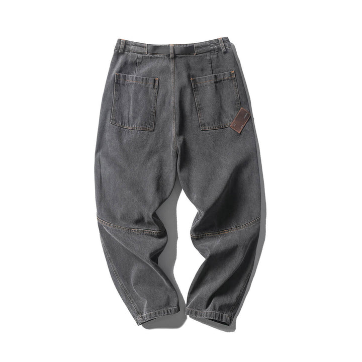 LEATHERTAG TAPERED JEANS