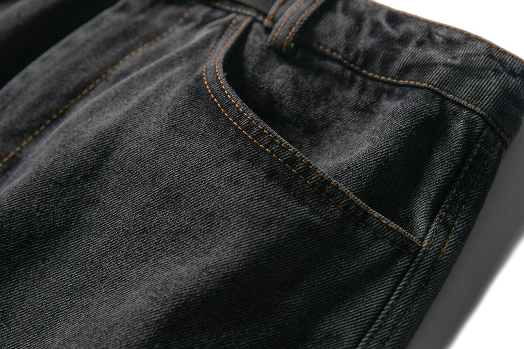 LEATHERTAG TAPERED JEANS