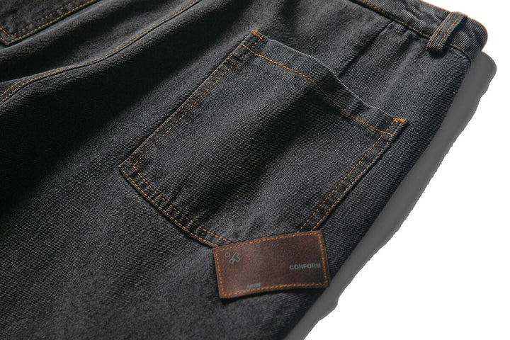 LEATHERTAG TAPERED JEANS